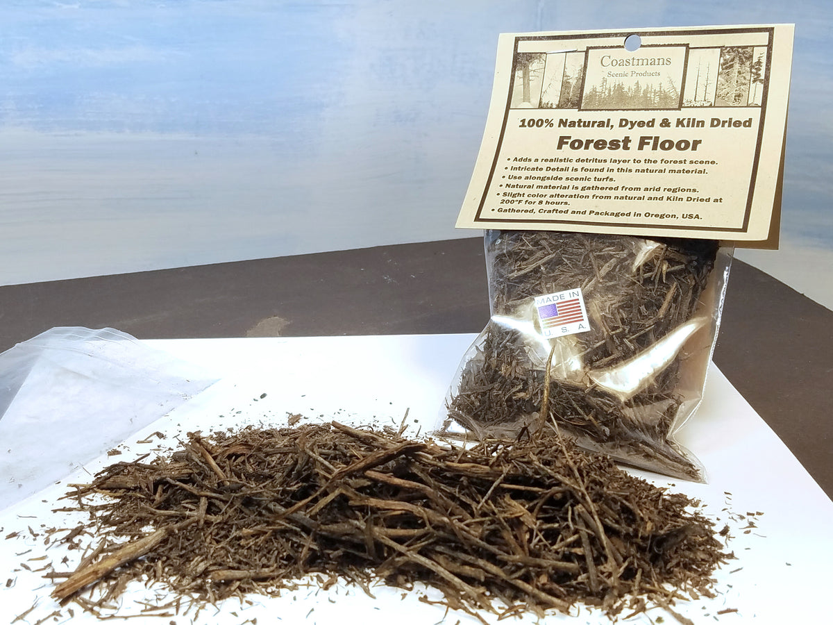 Open package of Coastman's Forest Floor, a natural twigs and sticks material used to model forest debris in HO, S, O and N scale for model railroads.