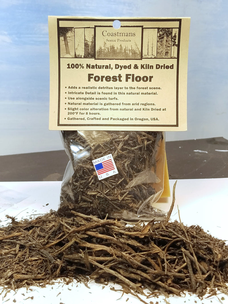 Open bag of Coastman's 100% Natural Dyed & Klin Dried Forest Floor material with a label on a white background.