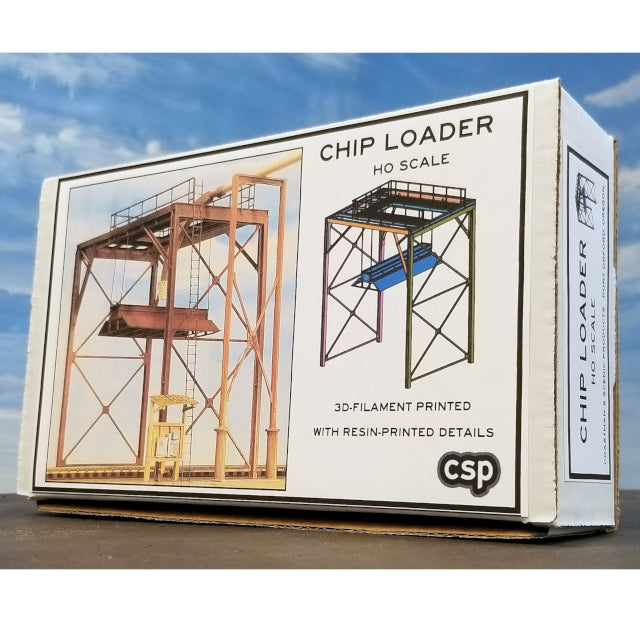 Box packaging of the HO scale wood chip loader kit produced by Coastman's Scenic Products showing box labeling and images of the model as built.
