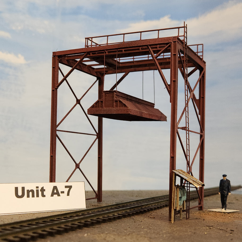 HO scale wood chip loader model unit A-7 end view with HO track and figure for size reference by Coastman's.