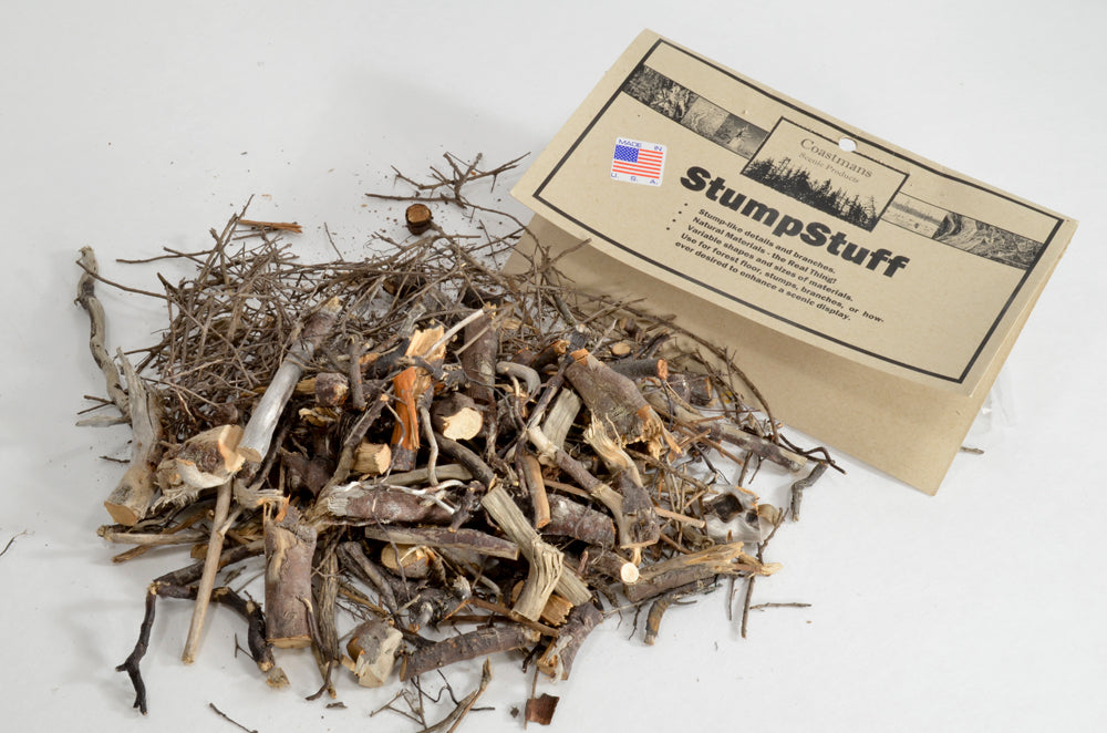Package of StumpStuff open and spread out, showing detail of scenic material inside
